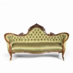 An elaborate Victorian shaped walnut sofa main