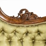 An elaborate Victorian shaped walnut sofa details