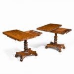 A companion pair of William IV flame-mahogany card tables opening