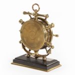 A brass ship’s novelty clock presented to Captain back