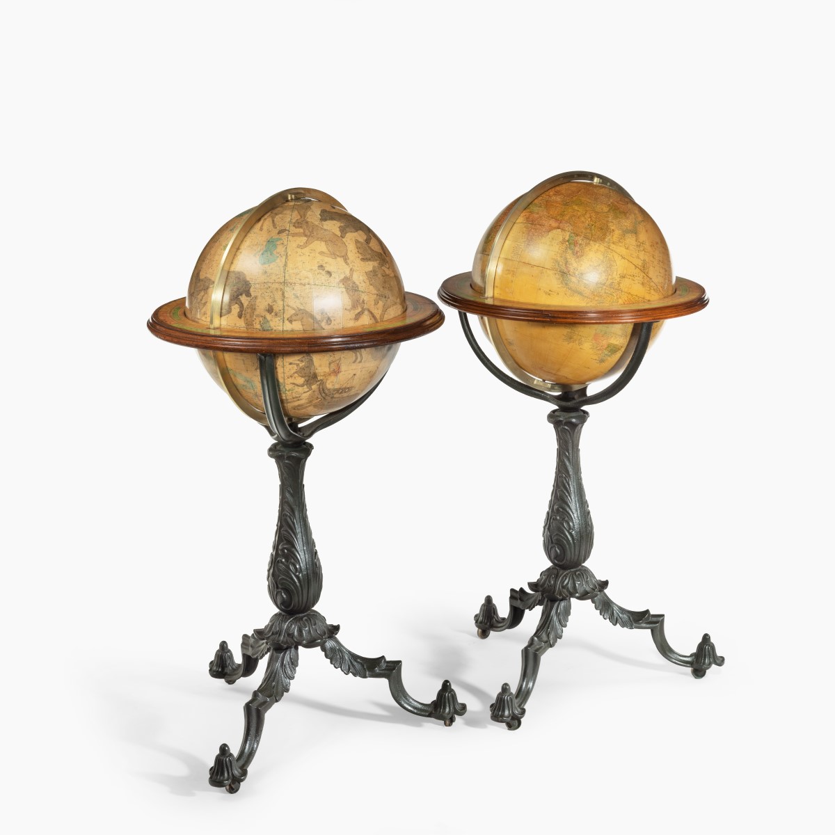 A Pair of 16-inch floor standing globes by Gilman Joslin,