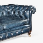 A Victorian 2-seater leather Chesterfield sofa