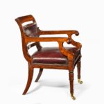 A rosewood library chair in the manner of Henry Holland made for the Senior Service Club side profile