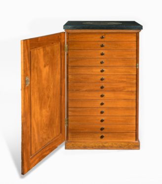 A Victorian mahogany collector’s cabinet with a fossil marble top