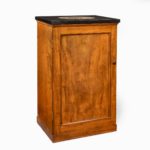 A Victorian mahogany collector’s cabinet with a fossil marble top,