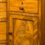 A late Regency mahogany side cabinet details