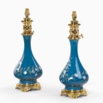 pair of French pate-sur-pate ceramic oil lamps