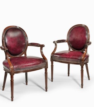 Two Edwardian mahogany chairs by Gill & Reigate