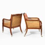 Regency mahogany bergère armchairs back and side