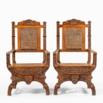 Indian throne chairs, carved with the arms of the Kingdom of Travancore