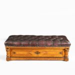 A Victorian walnut Ottoman in the Aesthetic style