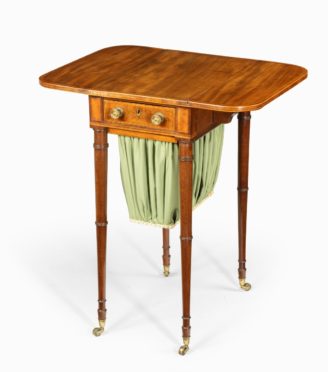 An elegant George III mahogany Pembroke sewing table