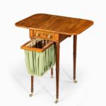 An elegant George III mahogany Pembroke sewing table open