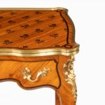 A delicate Napoleon III kingwood parquetry side table attributed to Sormani corner