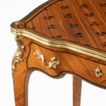 A delicate Napoleon III kingwood parquetry side table attributed to Sormani corner with drawer