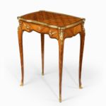 A delicate Napoleon III kingwood parquetry side table attributed to Sormani