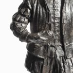 A bronze model of Sir Francis Drake, by Herbert H Cawood arm detail