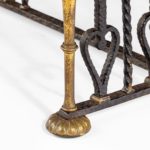 A Parcel gilt wrought iron stool attributed to Oscar Bach bottom close up