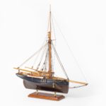 A shipyard model of a gaff-rigged Newhaven Smack side ship