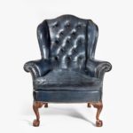 Chippendale style leather wing armchairs