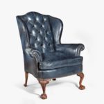Chippendale style leather wing armchair