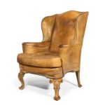 pair of walnut wing armchairs in the Queen Anne style left