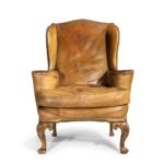 A pair of walnut wing armchairs Queen Anne