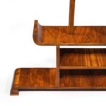 A pair of asymmetrical Art Deco walnut shelves left side