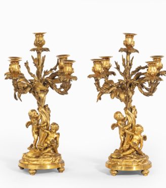 A pair of fine Napoleon III ormolu 5-branch candelabra,