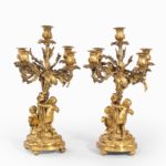 A pair of fine Napoleon III ormolu 5-branch candelabra back