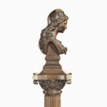 A bronze column depicting ‘La Colonne de la Republique’ dated 1889 bust side