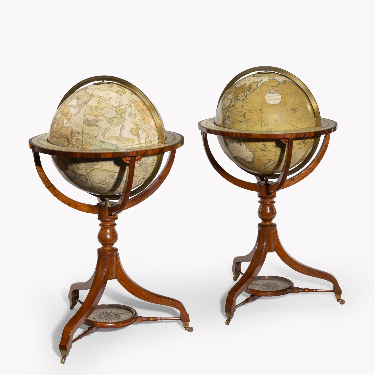 A pair of 18 inch floor standing globes by C Smith & Son