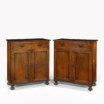 A pair of late Regency rosewood side cabinets, attributed to Gillows