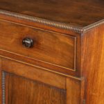 A pair of late Regency rosewood side cabinets attributed to Gillows close up