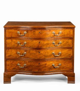 A George III Chippendale period mahogany serpentine chest