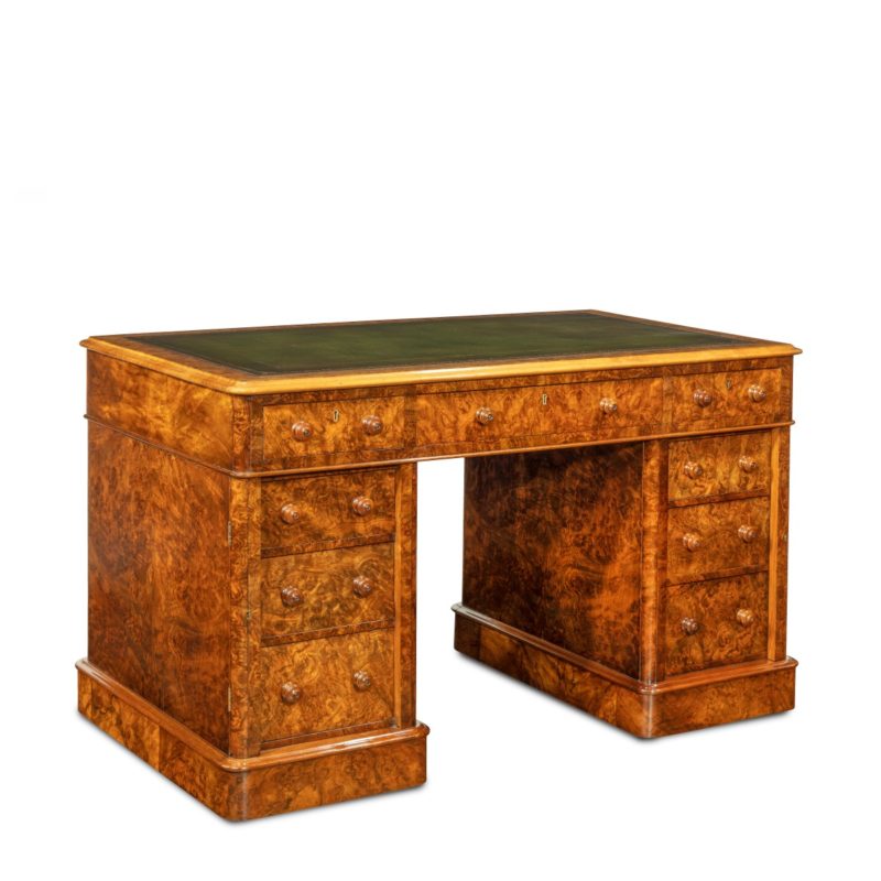 A Victorian burr walnut free standing pedestal desk by Druce & Co