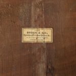 A Victorian burr walnut free standing pedestal desk label