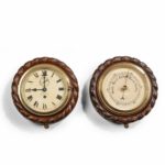 A bulkhead clock and barometer set by Heath & Co
