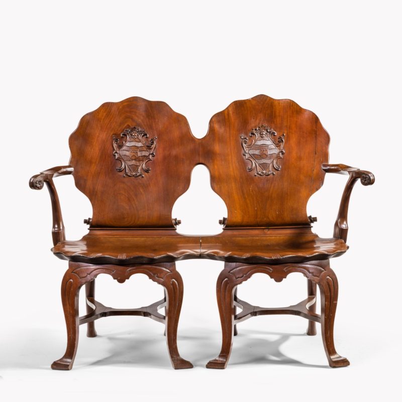 An exceptional late George II mahogany settee, made for Anne Basset, daughter of Edmund Prideaux, 5th Baronet of Netherton, attributed to William Hallett.