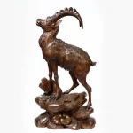 A Black Forest wood carving of an Ibex side