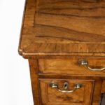 A George III Chippendale period mahogany chest of drawers corner top