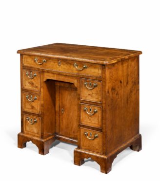A George III Chippendale period mahogany chest of drawers, of typical form with a brushing slide above four graduated long drawers, with the original handles and bracket feet. English, c1785.