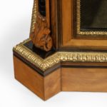 A Victorian satinwood breakfront side cabinet foot