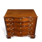 A flame mahogany George III serpentine chest of drawers top