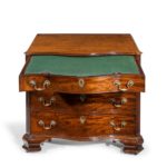 A flame mahogany George III serpentine chest