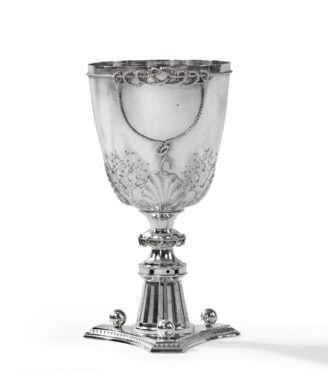 A silver cup by Henry Wilkinson, dated 1874
