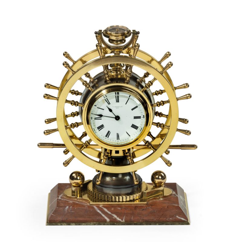 A Victorian brass novelty clock by Elkington & Co