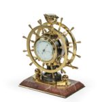 A Victorian brass novelty clock
