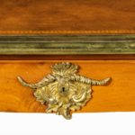 details Louis XV-style mahogany bureau plat