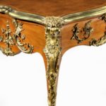 corner close up of Louis XV-style mahogany bureau plat after a model by Jacques B. Dubois, from the estate of Phyllis McGuire